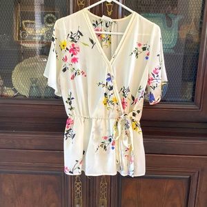 Very cute light cream floral top side tie size L